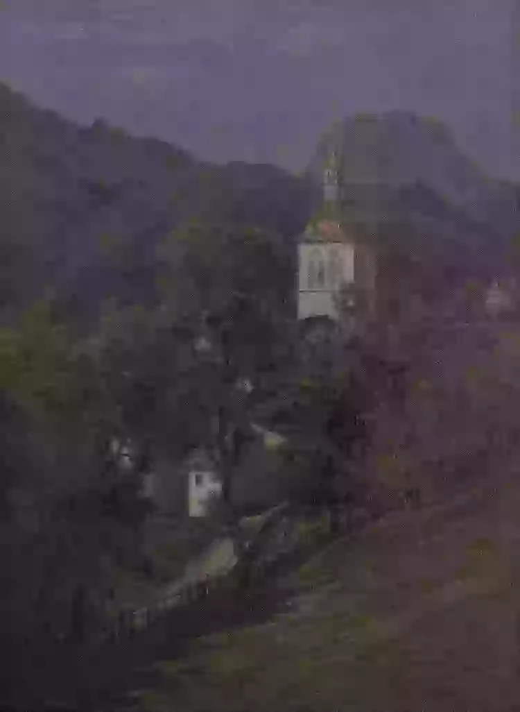 Vue de l’église de Gruyères au clair de lune